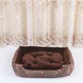 Round cloth pet bed for dogs and cats showing multiple colour pattern options and size range.