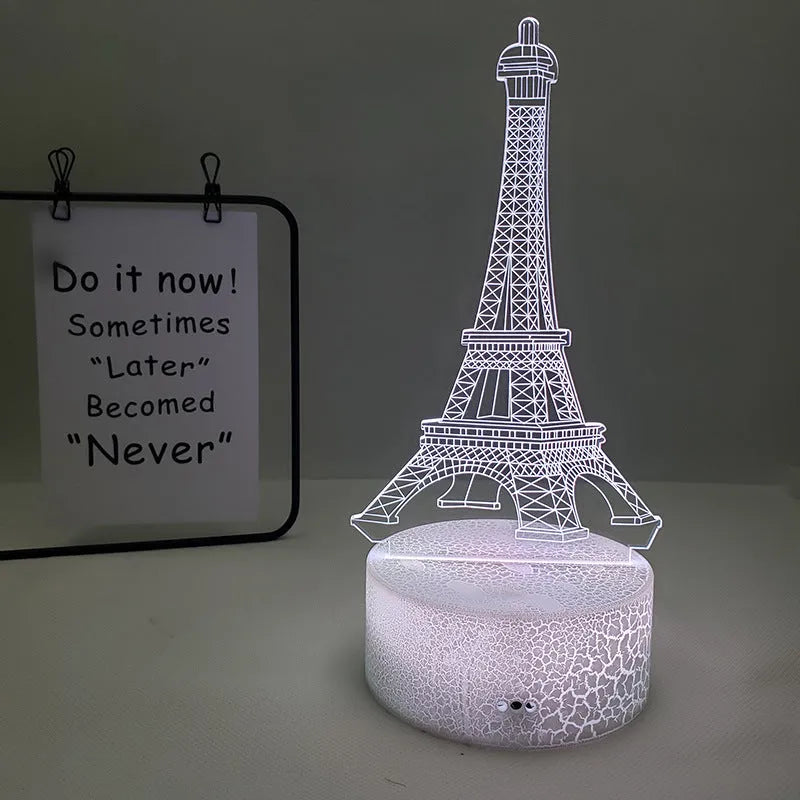 Eiffel Tower themed table lamp with multicolour LED glow on a acrylic shade.