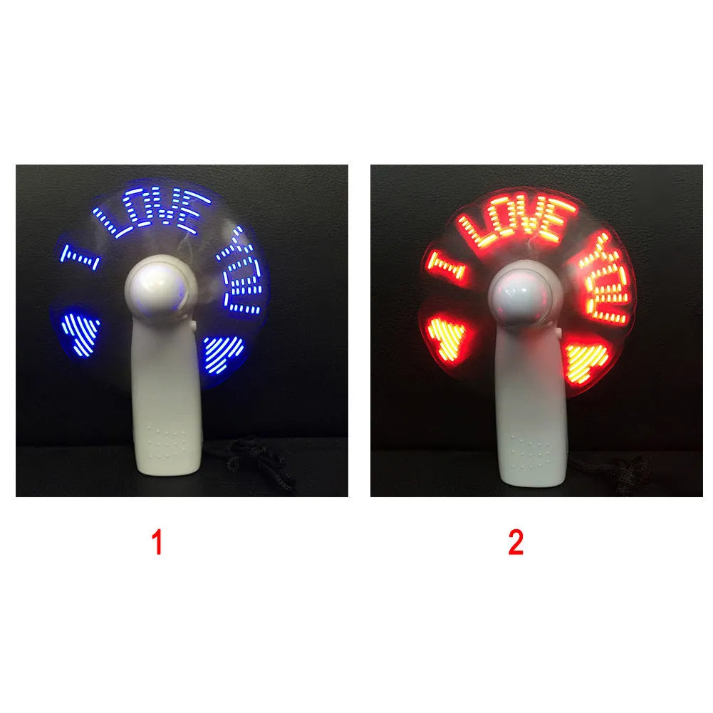 White handheld mini fan with flashing blue I Love You LED display, showing dimensions.