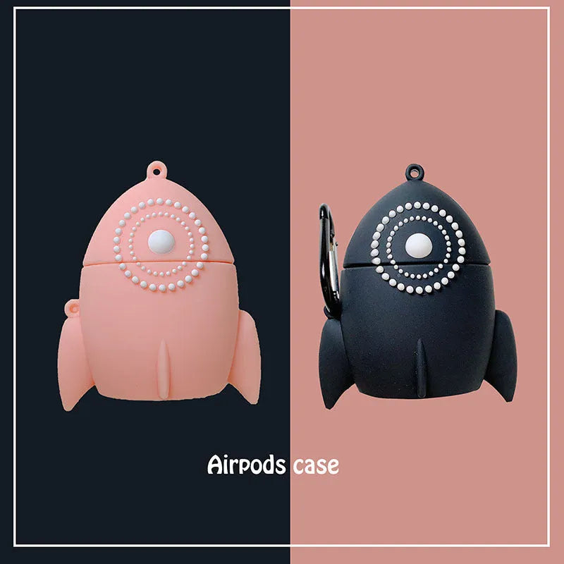 Pink silicone AirPods case with raised rocket design next to black plain version