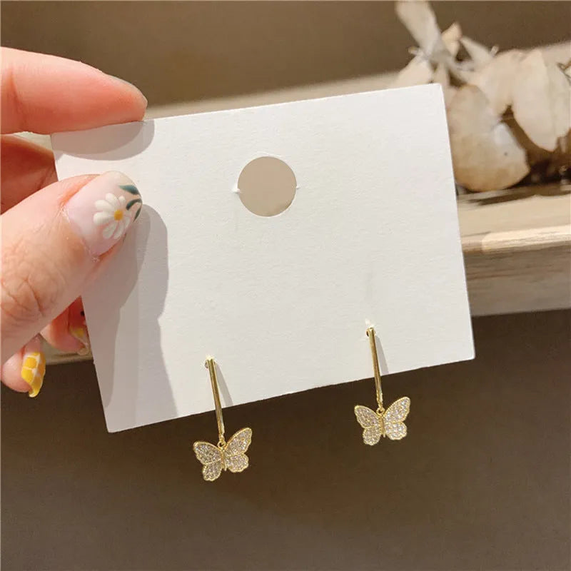 Alloy golden butterfly tassel earrings with electroplated finish for women