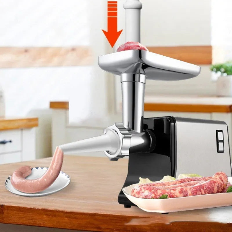 Silver meat grinder with double mixing blade, aluminium tray, and attachments on countertop