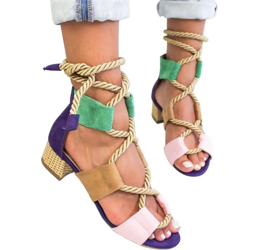 Women's beige suede sandals with thick heel, fish mouth toe, and front ankle strap.
