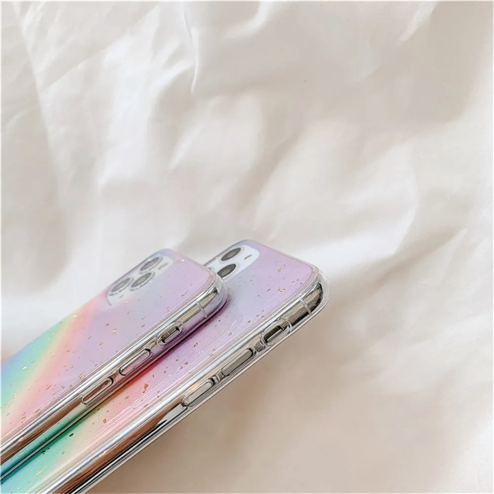 Colourful rainbow gradient striped TPU protective case for various iPhone models on a white background.