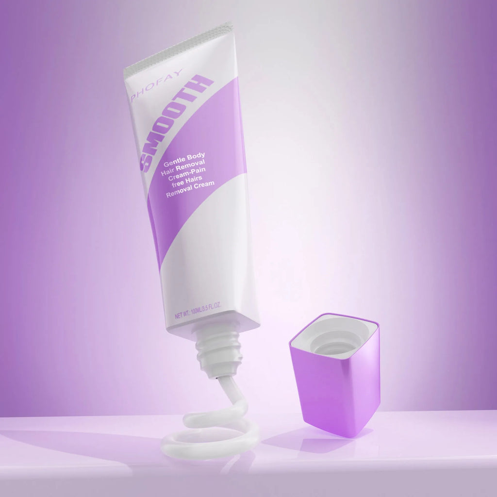 PHOFAY pain free hair removal cream tube with applicator and scraper tool on a bathroom surface