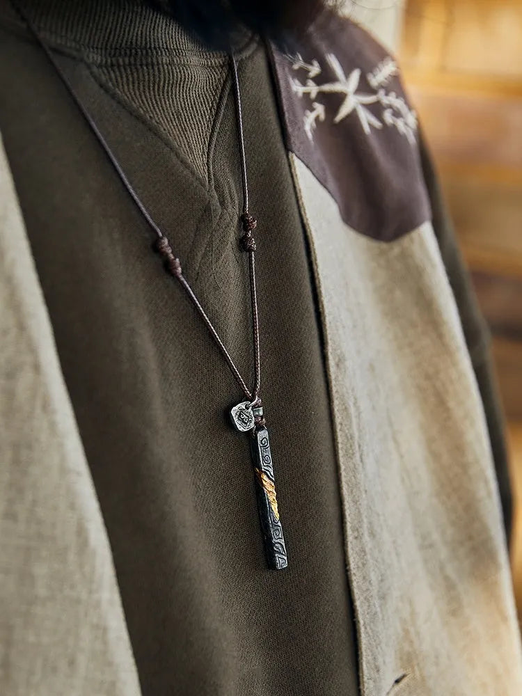Handmade sterling silver men's necklace with gold inlay and gemstone detail