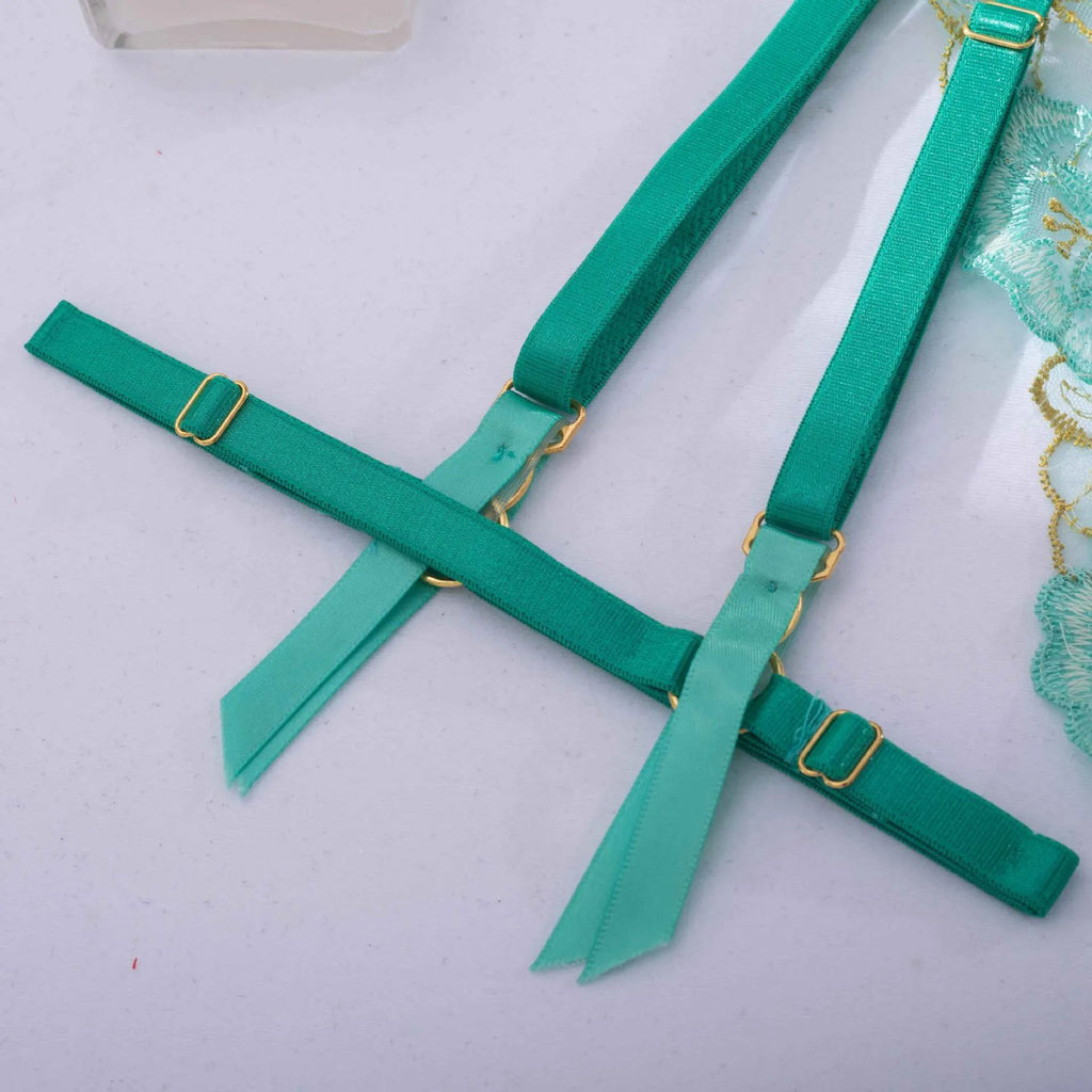 Light green women's bra set with embroidery detailing and matching bikini bottoms.