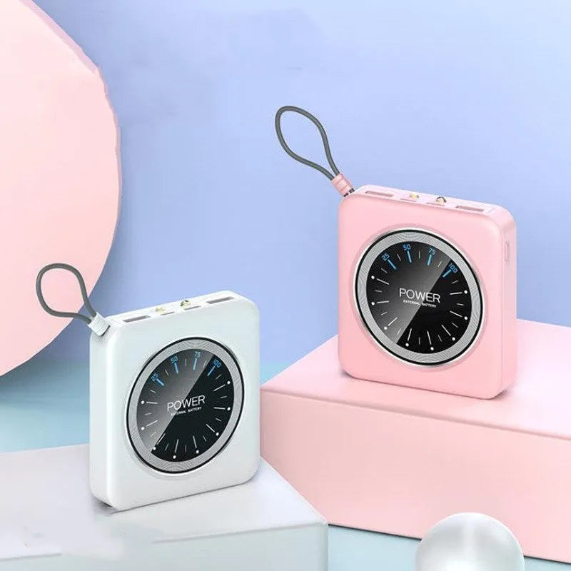 Compact alloy-cased power bank with a digital clock display, shown in mint green, with two USB output ports.