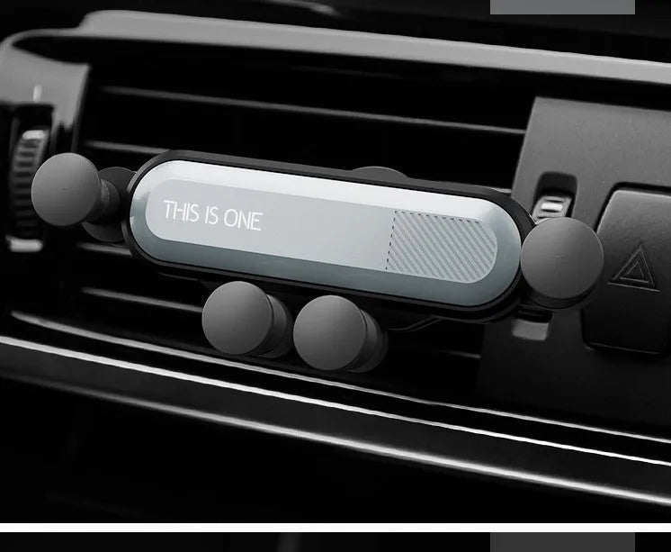 Universal car air vent phone holder bracket in multiple colours mounted on vehicle ventilation outlet