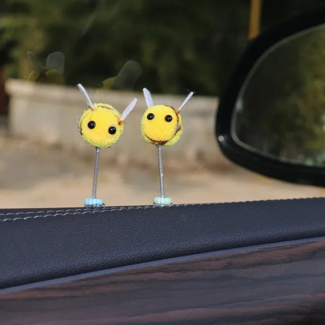 Small fur ball bee car decoration measuring 3cm square with cartoon design