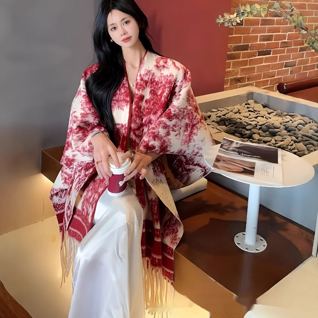 Women's free-size polyester scarf cape with tassel fringe in a choice of colours.