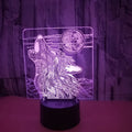 Colour-changing LED desk lamp with acrylic shade and remote control on wooden desk