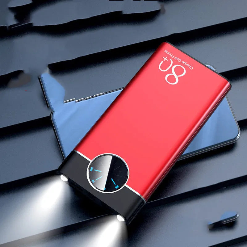 Black 20000mAh alloy portable power bank with LED flashlight showing size scale