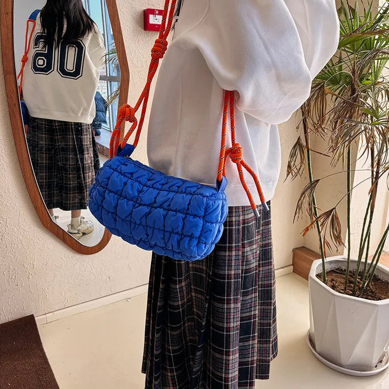 Soft pillow-shaped women's nylon messenger bag in choice of colours on adjustable crossbody strap.