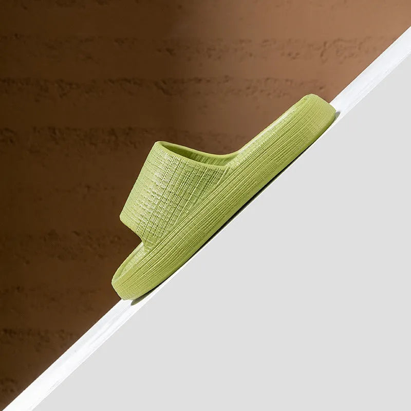 Women's soft EVA non-slip toe ring flip-flop slippers in five colour options.