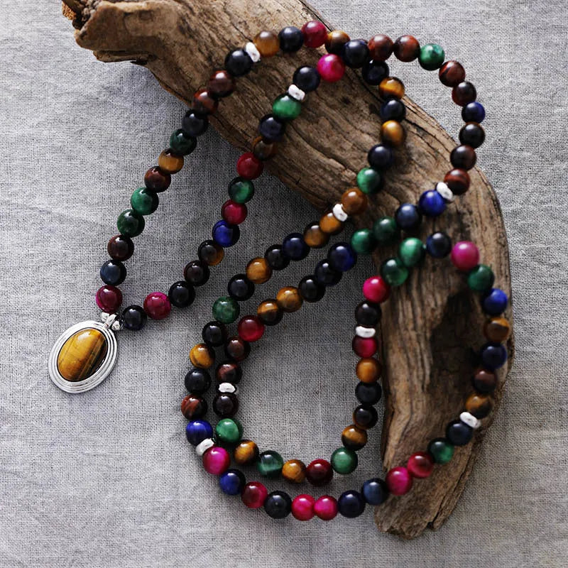 Natural stone meditation necklace with tiger eye pendants and symbolic charms on adjustable ball bead chain