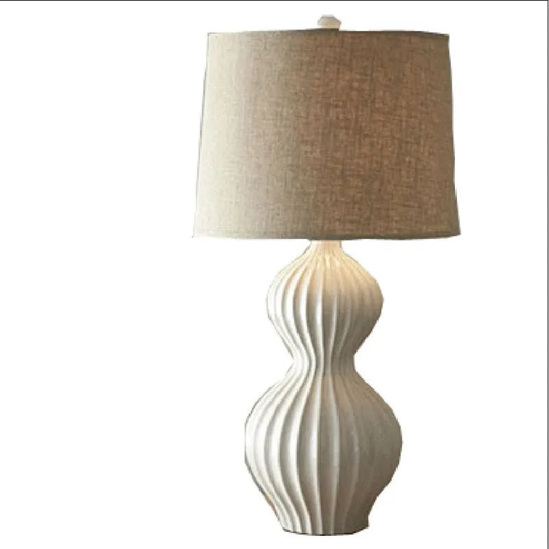 Jingdezhen ceramic table lamp with white fabric shade, 62cm tall on a wooden table.