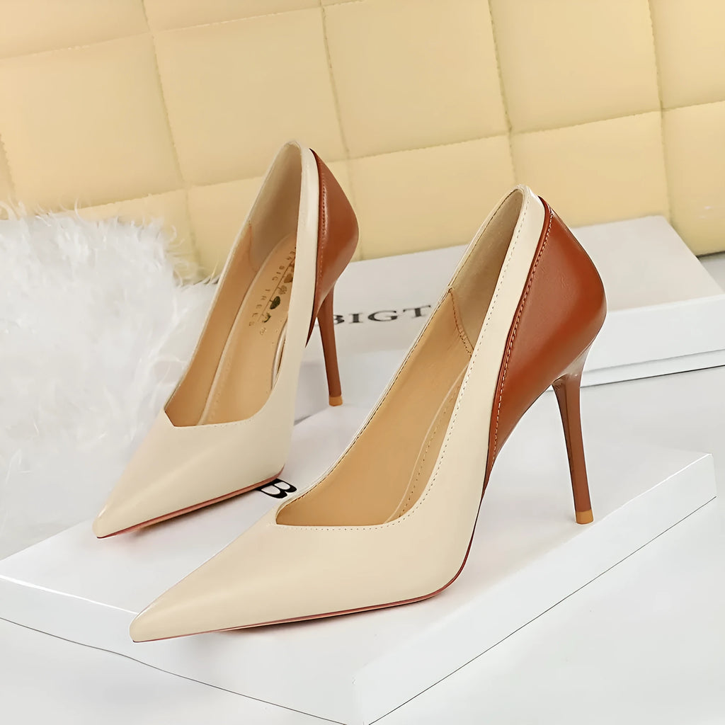 Women's black retro stiletto high heel pumps with pointed toe and super high heel