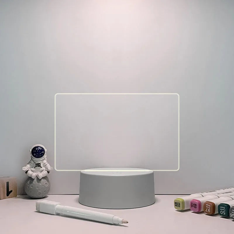 Acrylic message board night lamp with warm light showing round base and multiple picture shape options