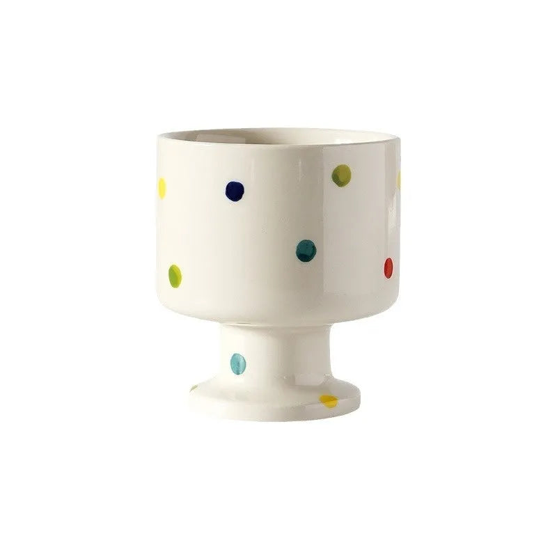 Handmade irregular solid colour ceramic mug on a table