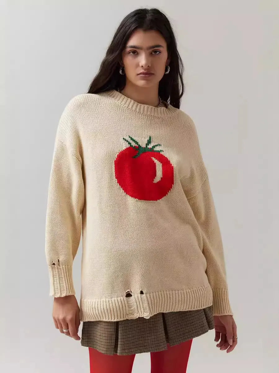 Beige women's loose-fitting acrylic jacquard knit sweater with round neck and long sleeves.
