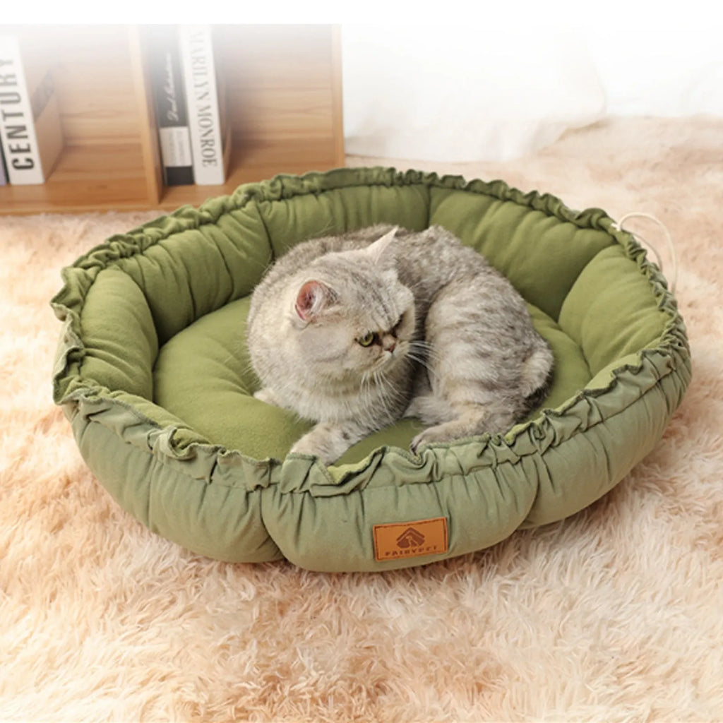 Grey reversible cat bed showing both donut and open nest configurations