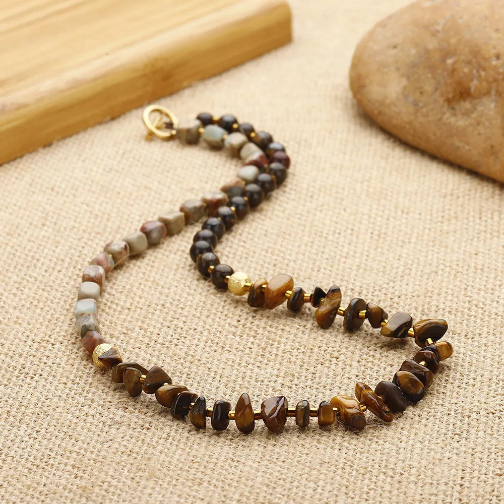 Tigereye stone and bronze geometric bracelet with texture details and bends design