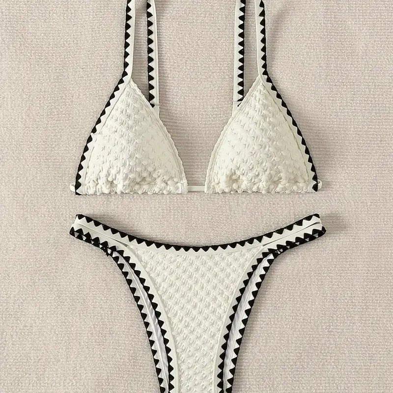 Women's white and blue split bikini swimsuit set with polyester fabric