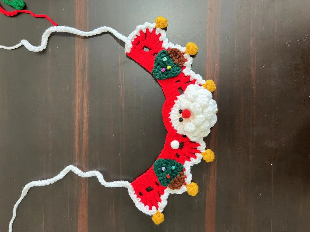 Knitted wool Christmas pet scarf clipped to dog collar in striped Santa pattern