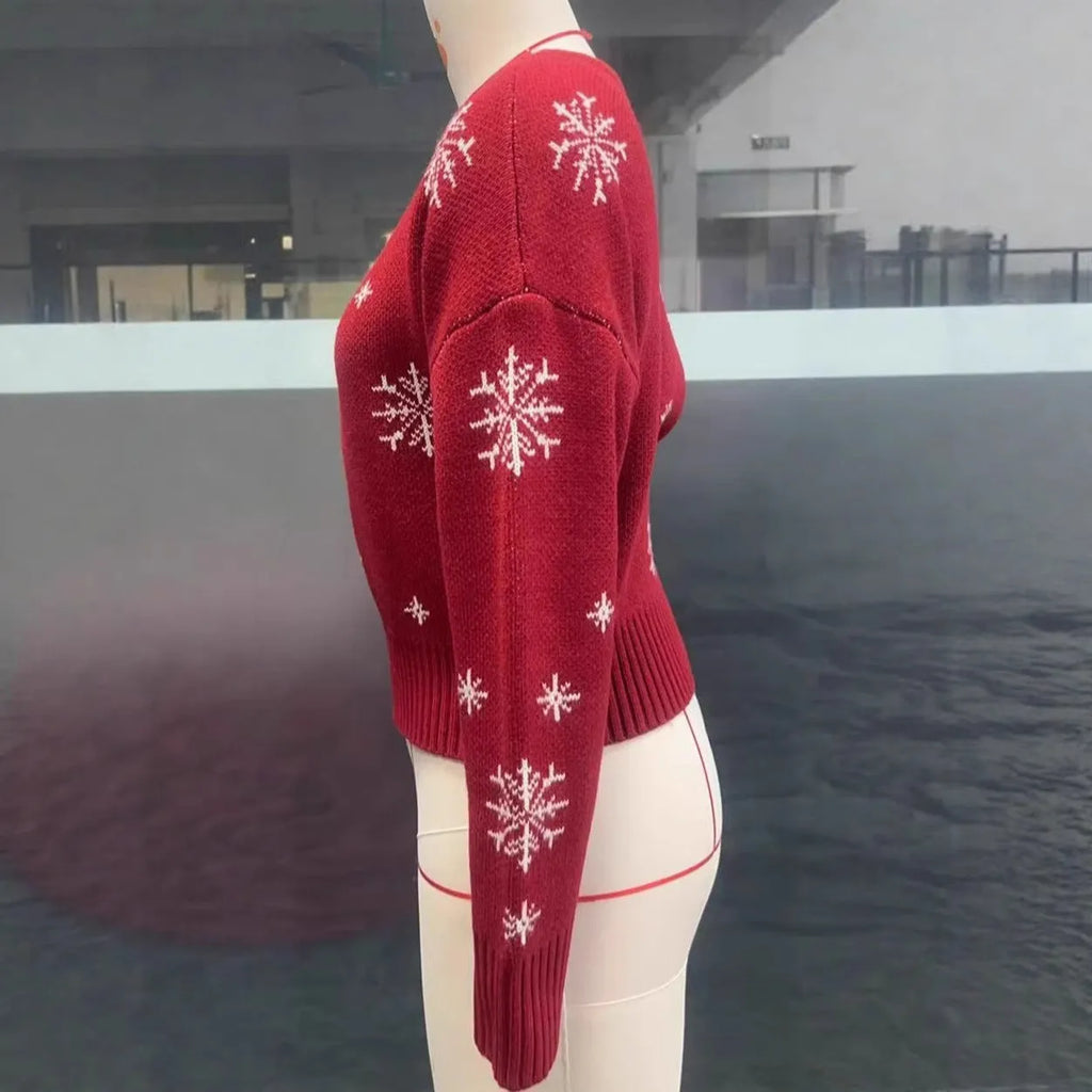 Women's snowflake jacquard pullover Christmas sweater in red with crocheted flowers and boat neck