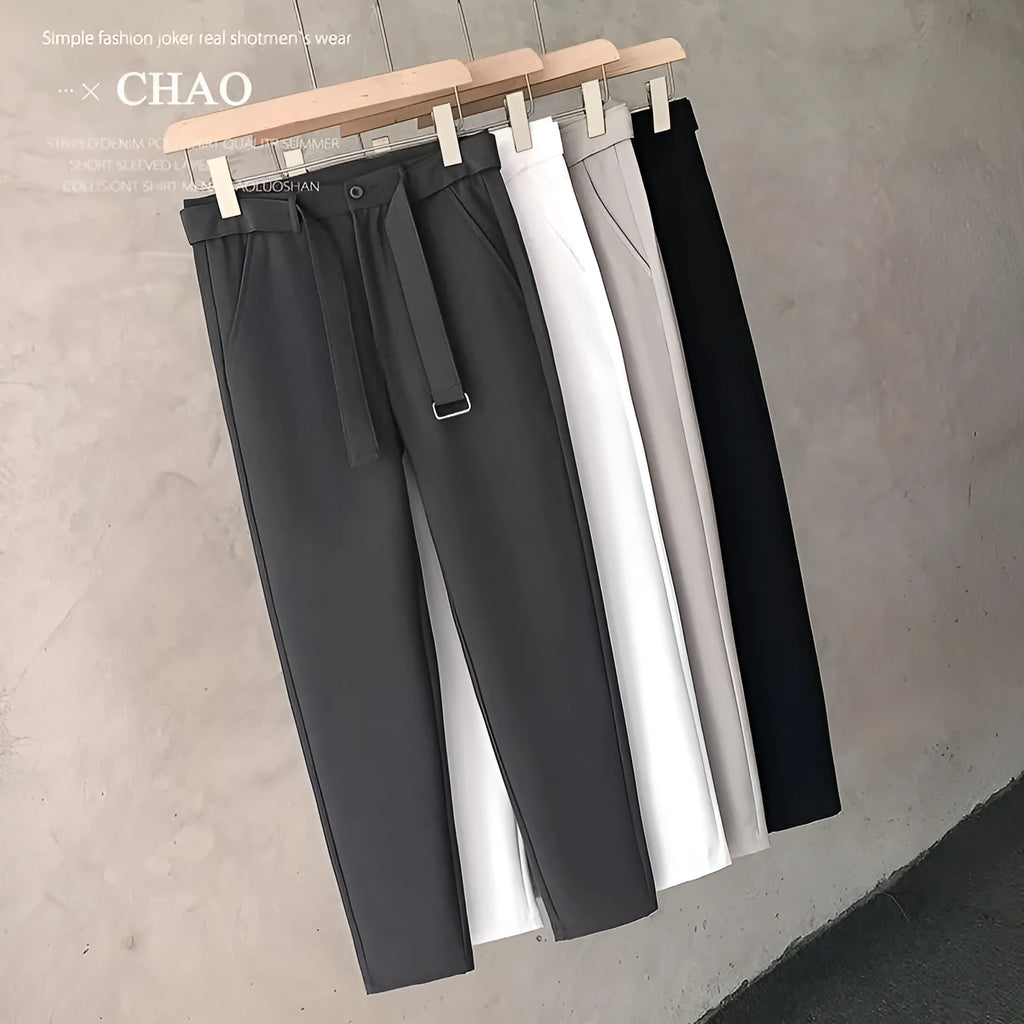 Boys slim straight wool trousers in tapered fit, shown in light grey colour.