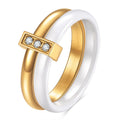Glossy black geometric ceramic ring with a 6mm wide band on a woman's finger.