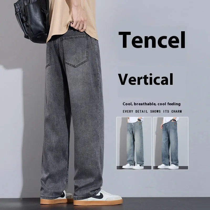Straight leg denim trousers in a wide leg style on a hanger, showing the zip fly placket.