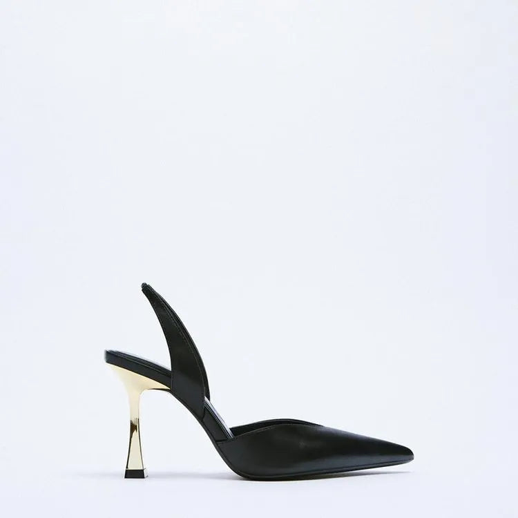 Women's pointed high heels in patent leather with a shallow mouth design, shown in apricot colour.