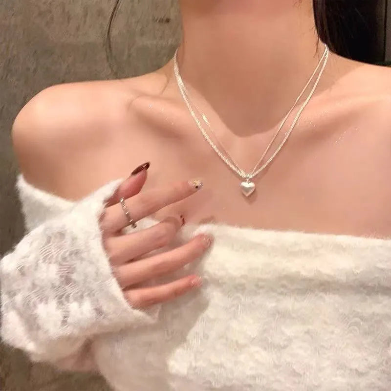 Women's double-layer brushed heart pendant necklace with adjustable silver chain