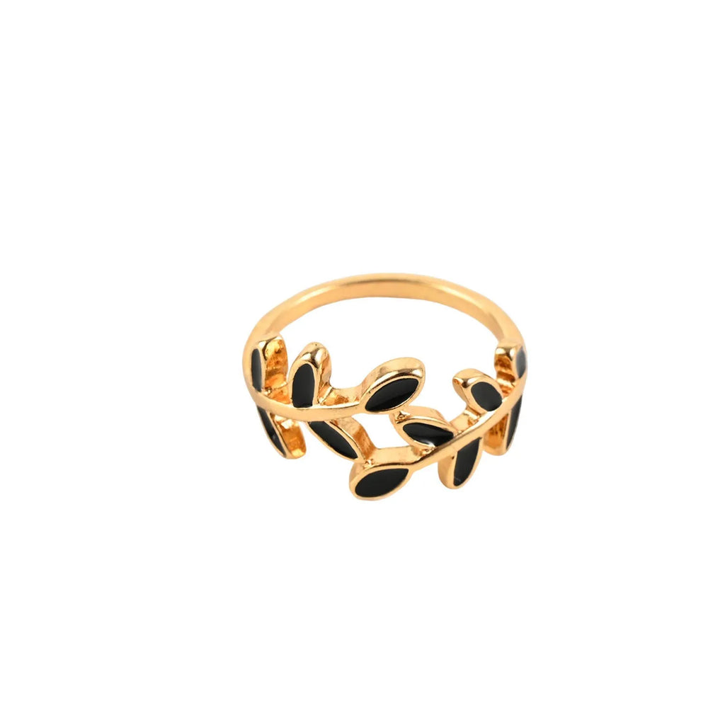 Gold geometric leaf design finger ring with floral elements and electroplated finish