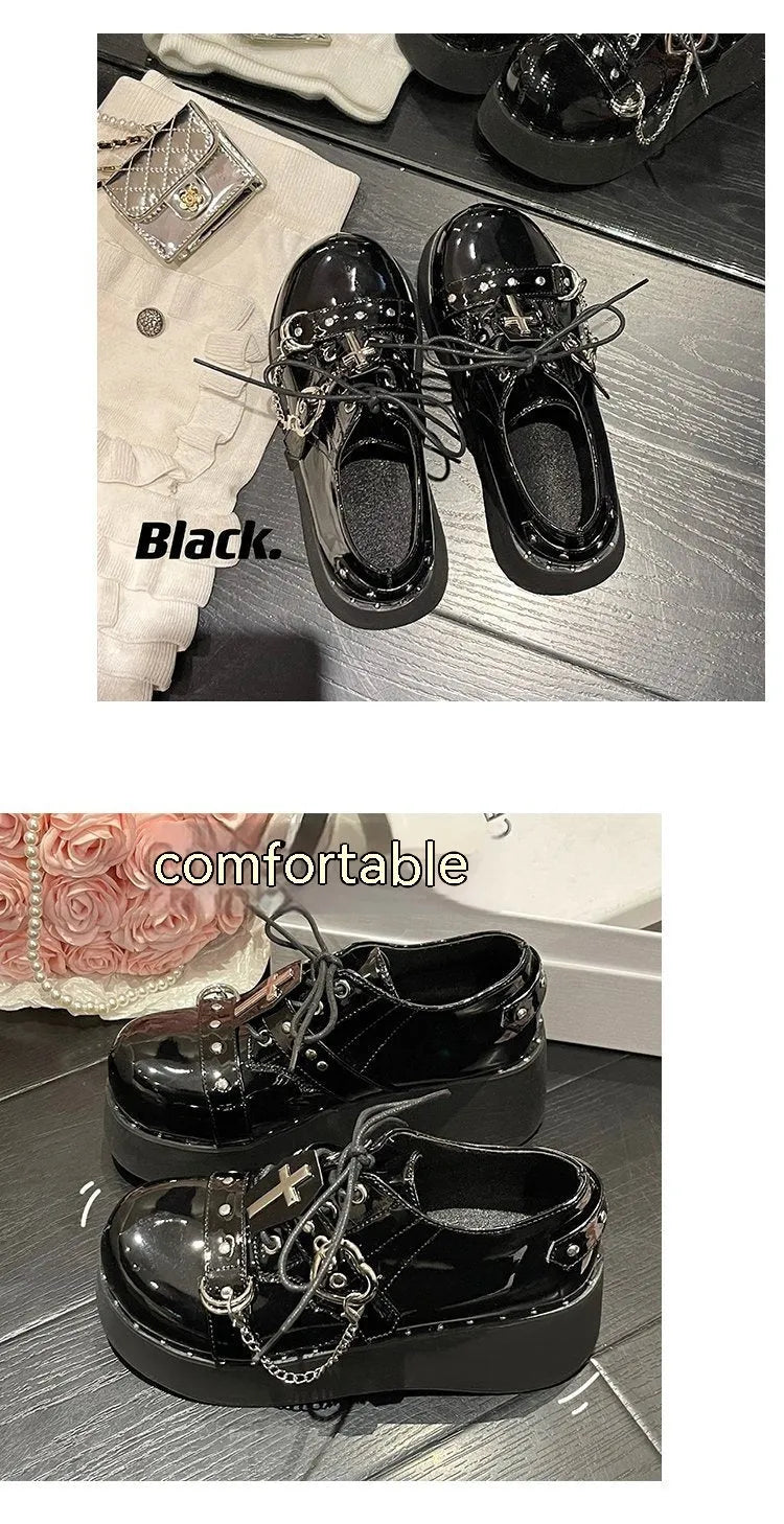 Solid black punk platform shoes with leather upper, rubber sole, and visible stitching detail