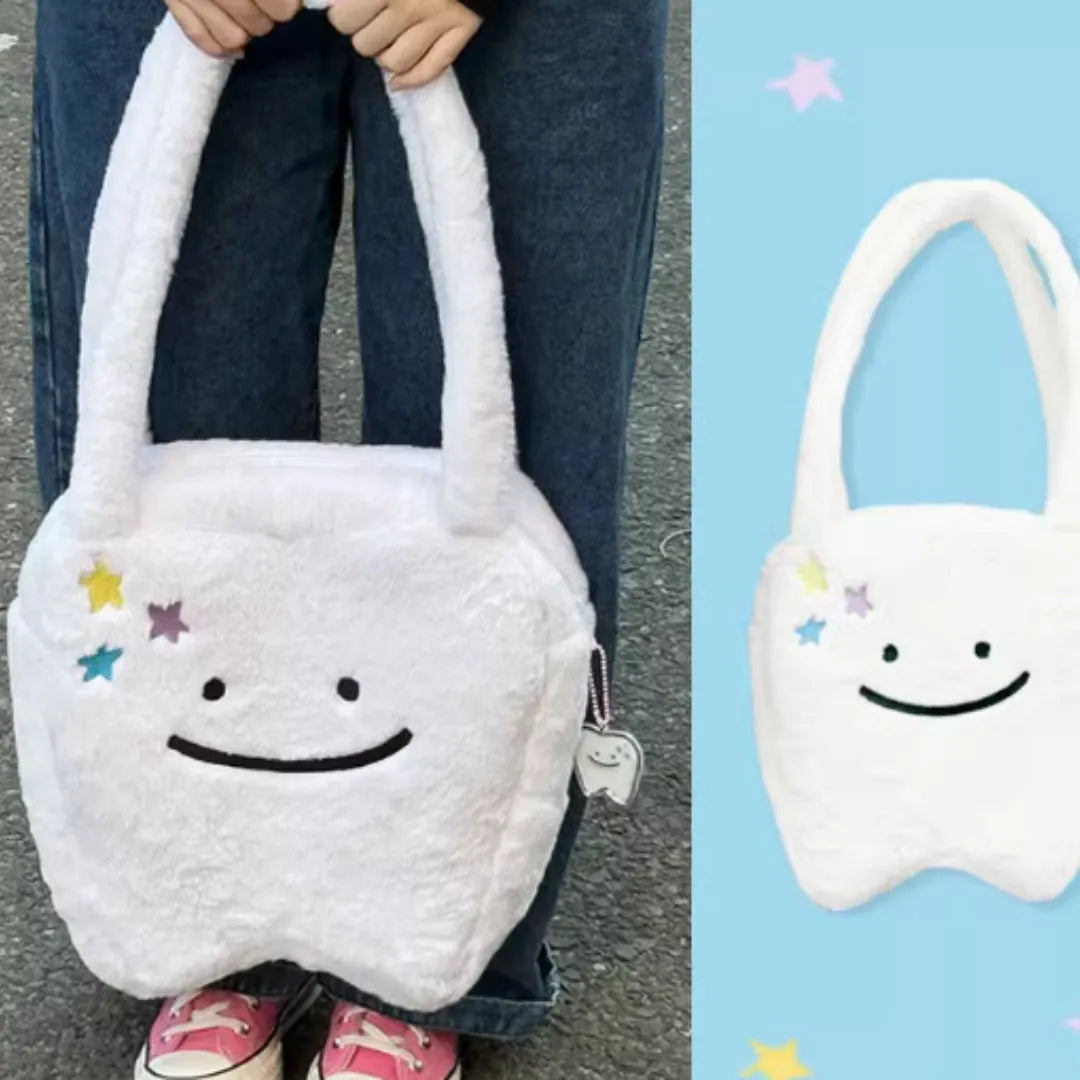 White plush shoulder tote bag with cute teeth design and zip opening