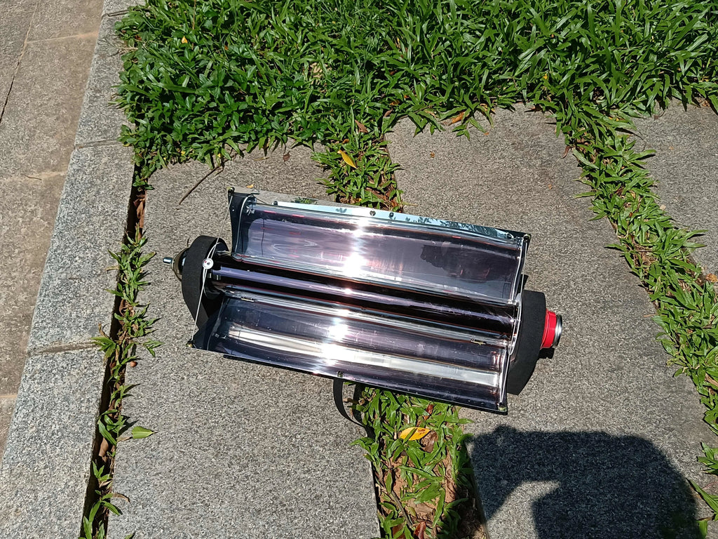 Portable smokeless vacuum tube grill in silver with 1.5L capacity, 620mm tube, and 49x35cm reflector.