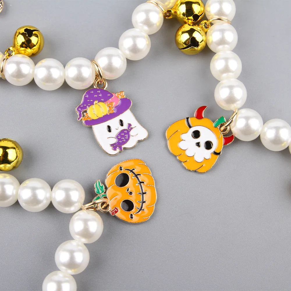 Halloween cat collar with simulated pearl necklace decoration showing three pumpkin design options