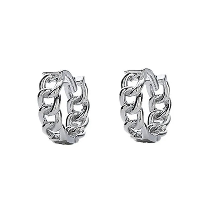 West Coast men's geometric copper earring studs on a plain background, showing silver and patterned options.