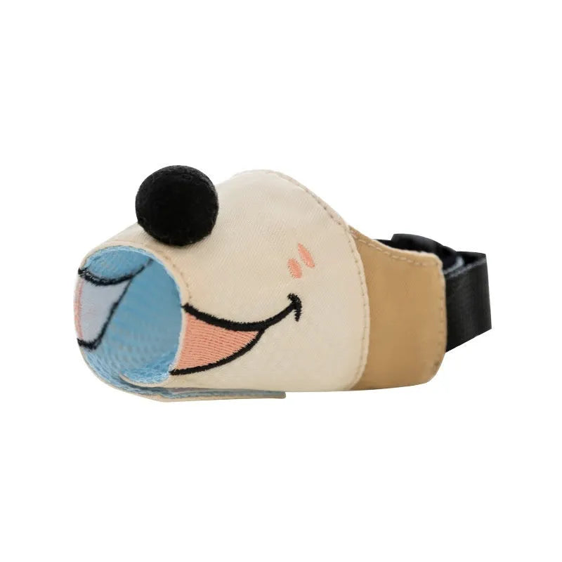 Canvas dog muzzle in Ollie Brown colour, shown on a dog, with adjustable straps and open design for panting.