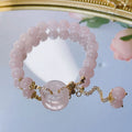 Pink crystal peace buckle bracelet on adjustable silver-plated chain for women