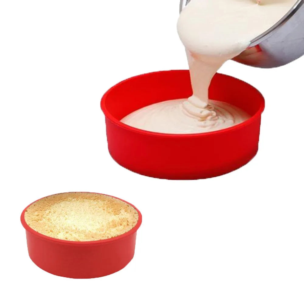Set of three bright red round silicone cake moulds in 4-inch, 6-inch, and 8-inch sizes on a kitchen counter.