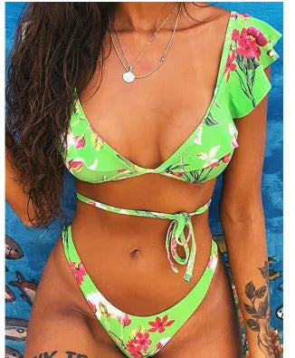 Yellow floral print split bikini swimsuit on a model