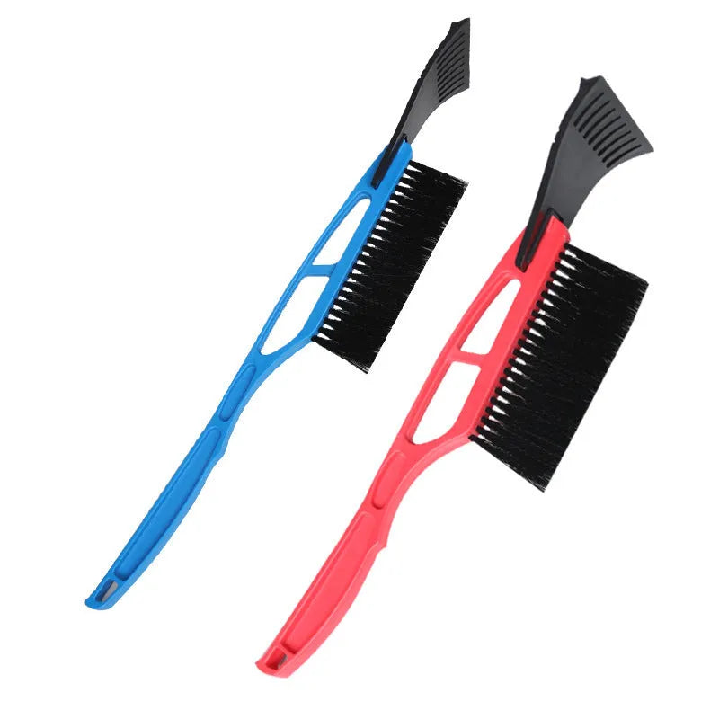 Blue hard plastic car snow shovel with nylon brush, 52 cm, on a windscreen with snow
