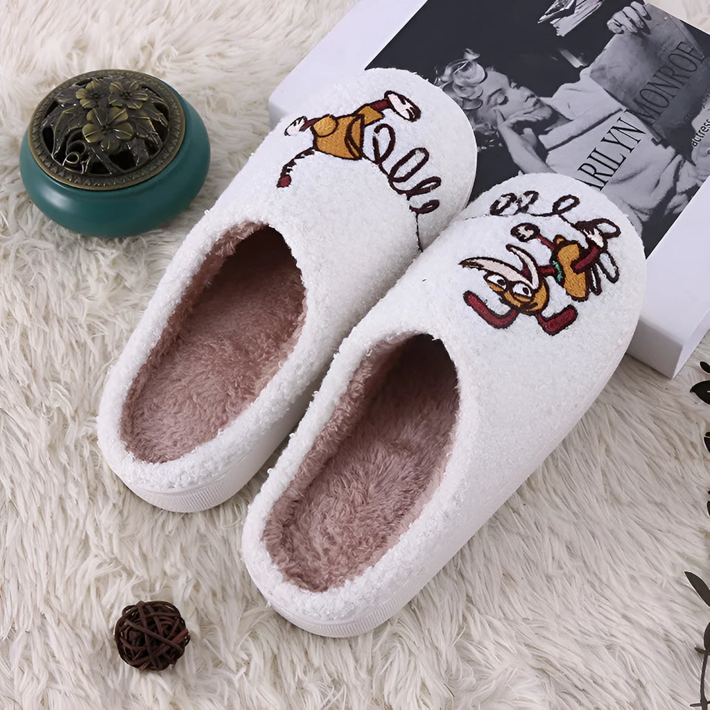 White cartoon pattern fluffy slippers with a non-slip rubber sole and toe holder design.