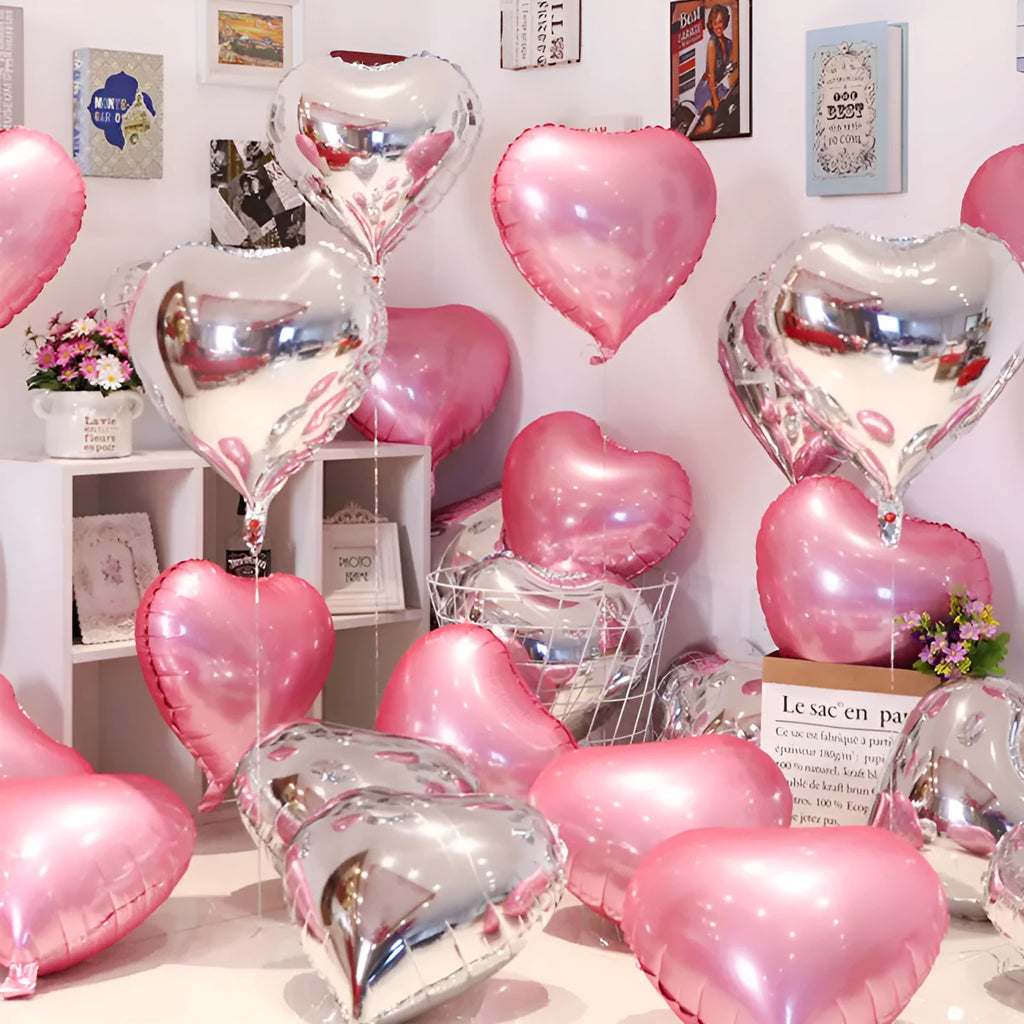 Set of five sparkling metallic peach heart-shaped aluminium foil balloons, 5 inches wide.