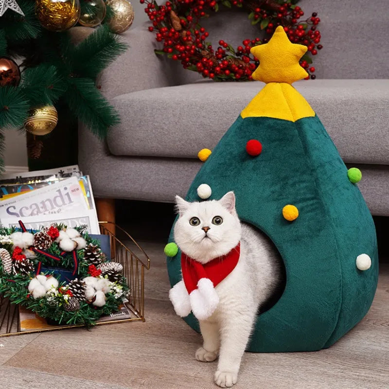 Red Christmas tree shaped plush cave bed for a cat or small dog on a wooden floor