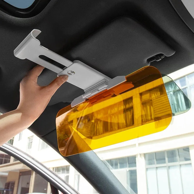 Telescopic anti-glare car sun visor with acrylic lenses mounted on a vehicle sun visor